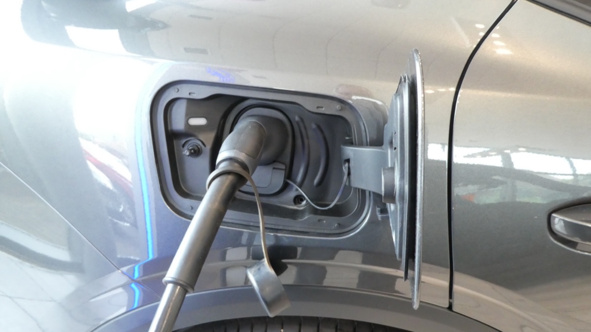 Type 2 EV charging connector plugged into an electric vehicle